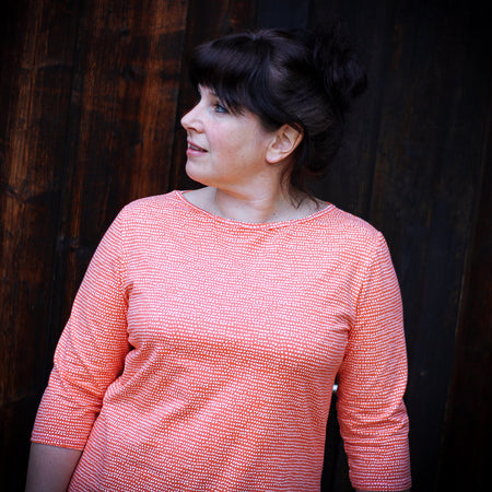 Fairtrade Biojersey Dotted Line Koralle