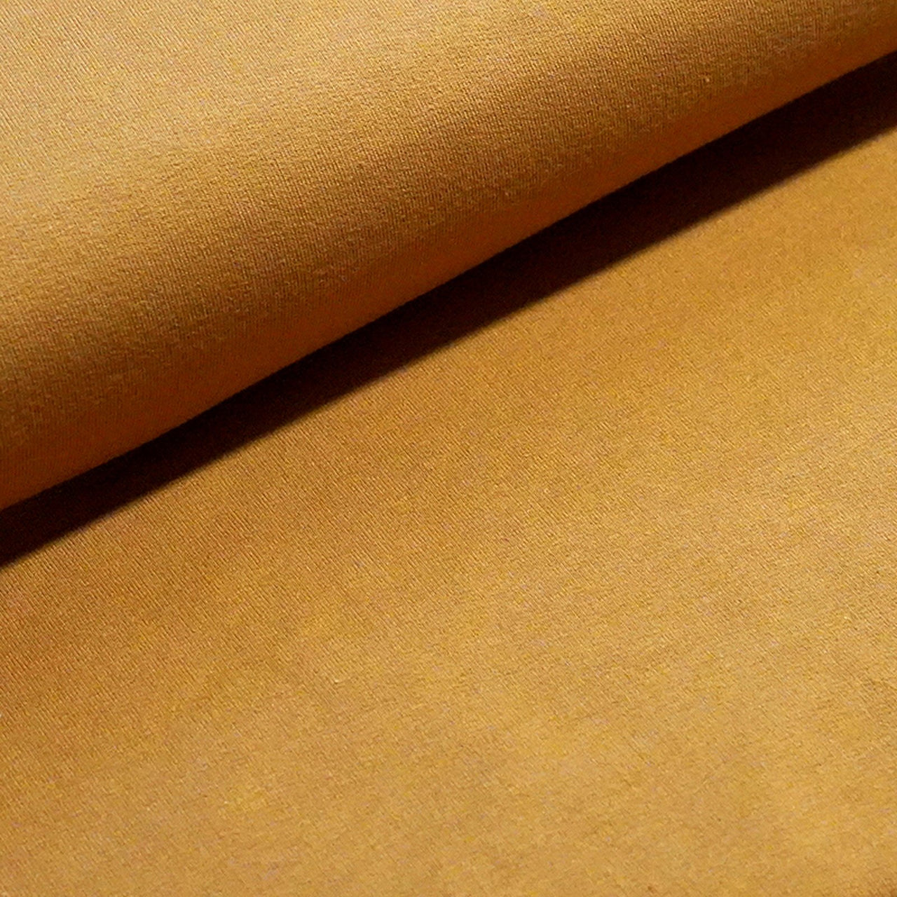 Fairtrade Biojersey Uni Messing (GOTS)