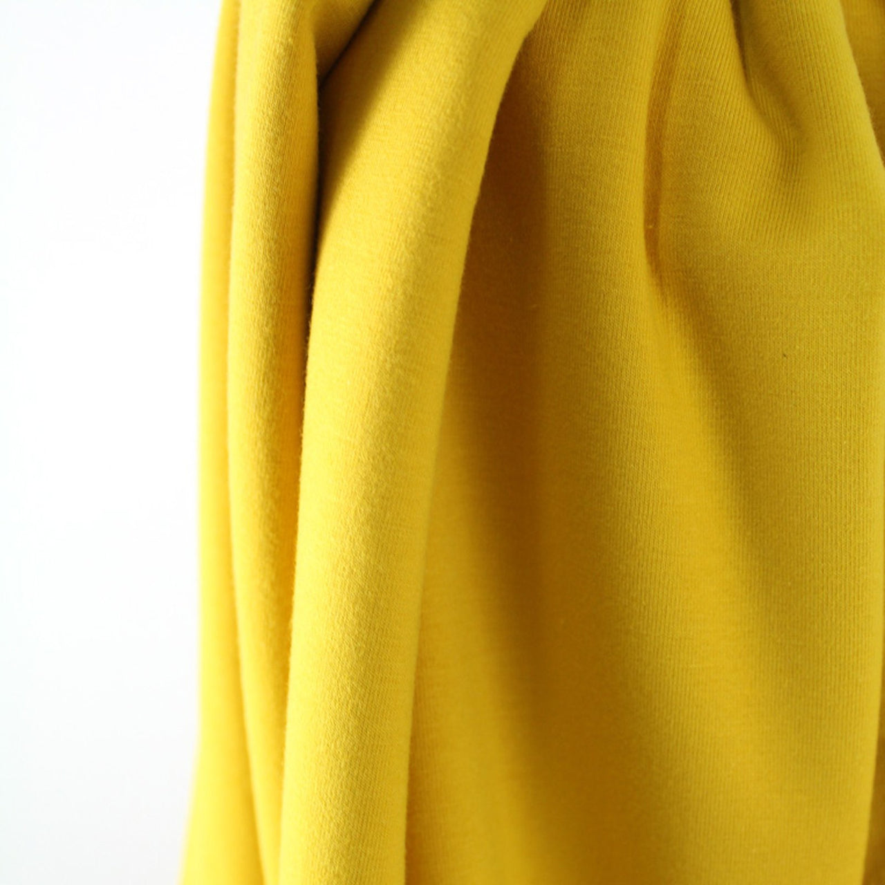 Fairtrade Biojersey uni Senf (GOTS)